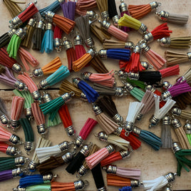 Leather tassels and rings 10pk